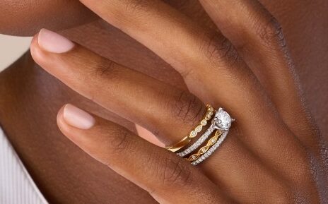 Close-up of custom stacked wedding rings with mixed metals